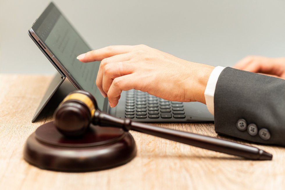 Digital transformation in legal profession: Wooden gavel was pla